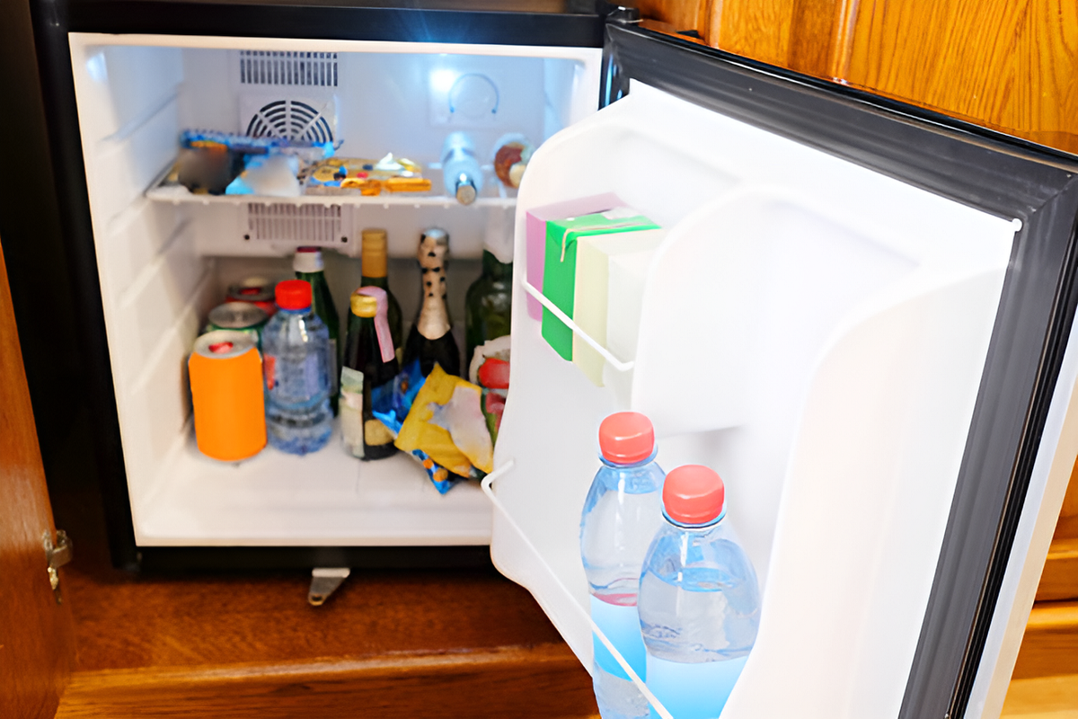 mini fridge filled with beverages